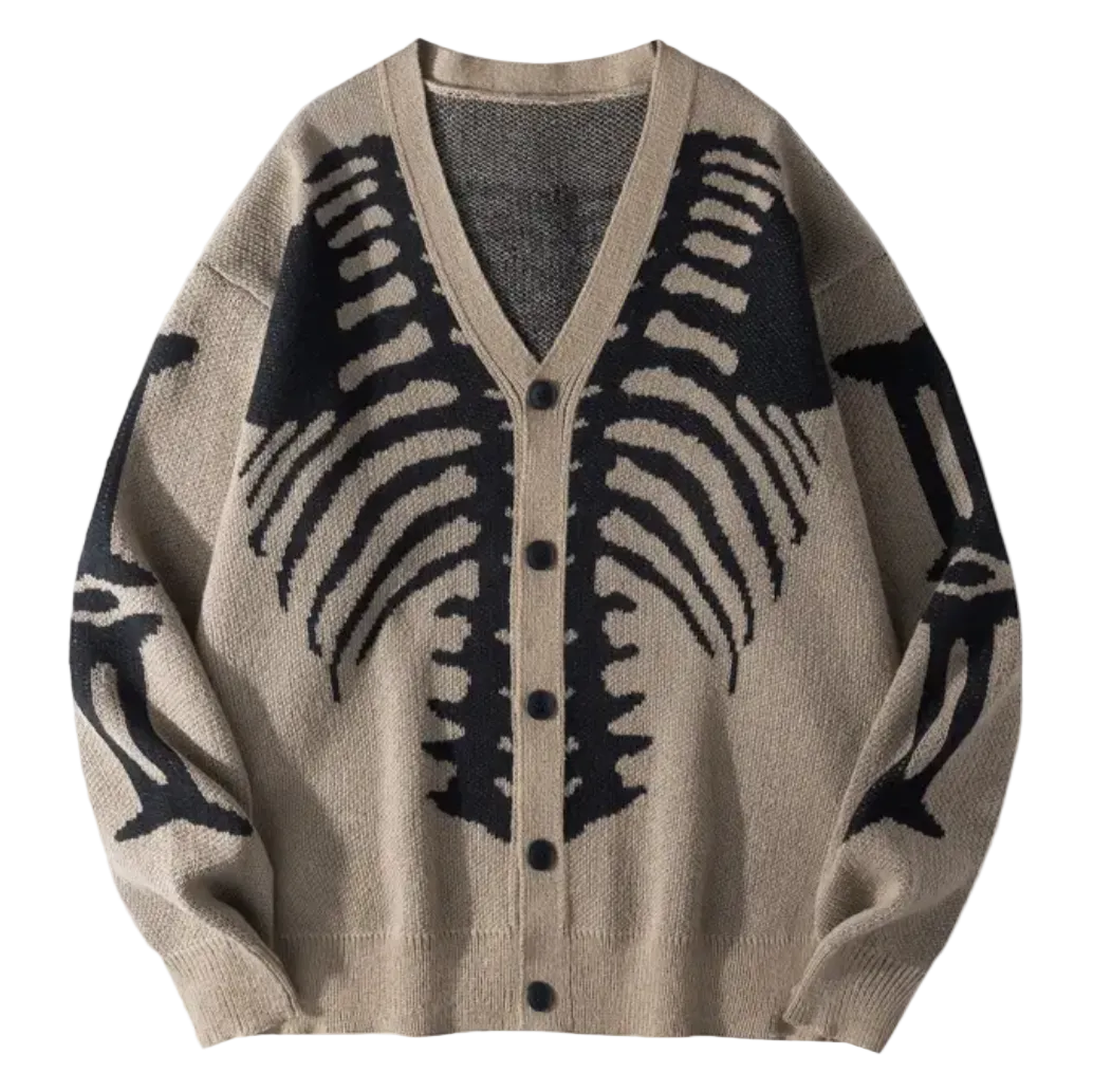 A beige knit cardigan sweater with a black bone or skeletal wing pattern across the front and sleeves, featuring a V-neck and button closure.