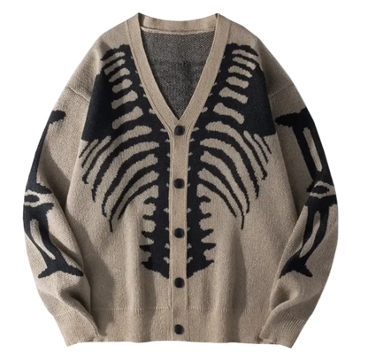 A beige knit cardigan sweater with a black bone or skeletal wing pattern across the front and sleeves, featuring a V-neck and button closure.