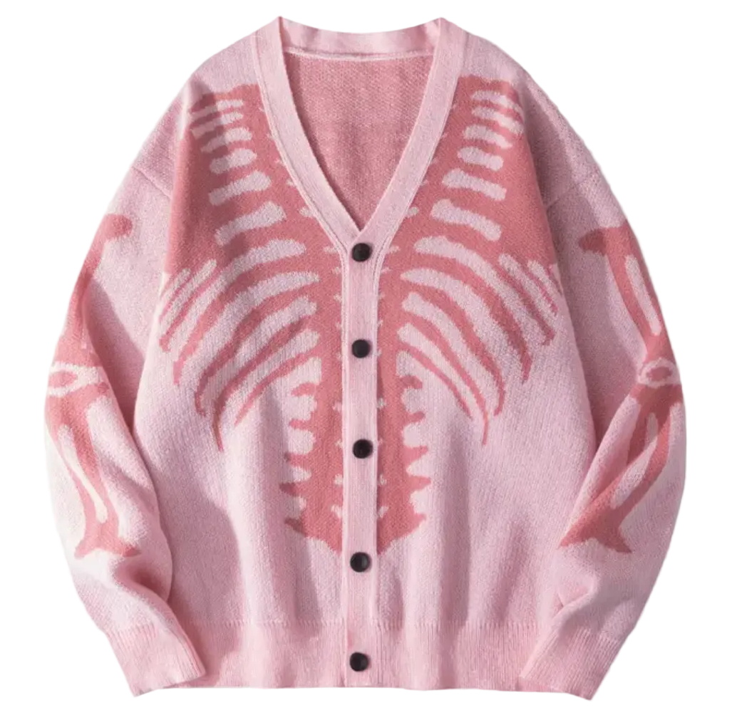 A pink knit cardigan sweater with a large white rib cage pattern across the front and black buttons down the center, laid flat on a white background.